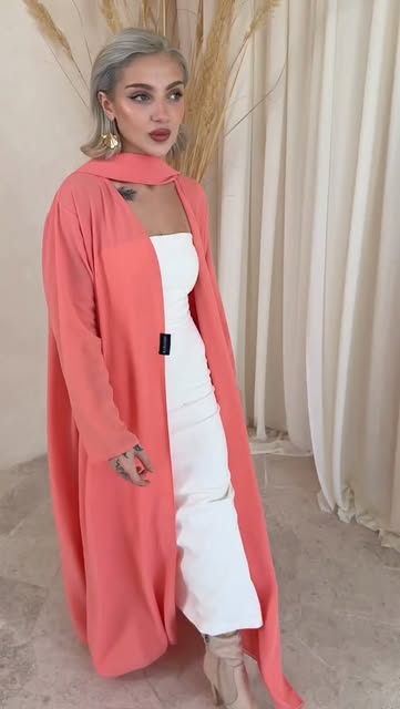 Bohox Instagram: coral outer layer over a white dress